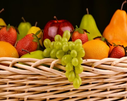 Assortment of fresh fruits and vegetables indicating nutrition